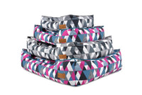 P.L.A.Y. Mosaic Lounge Beds with colorful geometric pattern in Tuxedo and Soda Pop colors stacked together.