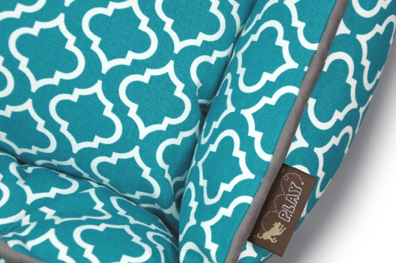 Teal P.L.A.Y. Moroccan Lounge Bed with intricate white patterns and 100% natural cotton fabric for dogs.